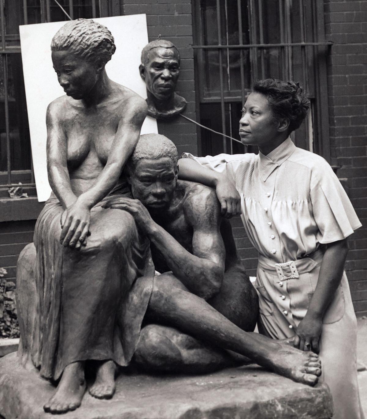 Augusta Savage with her sculpture Realization, 1938.